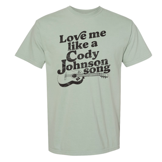 jade green with "Love me like a Cody Johnson Song" and a guitar depicted below the caption. 